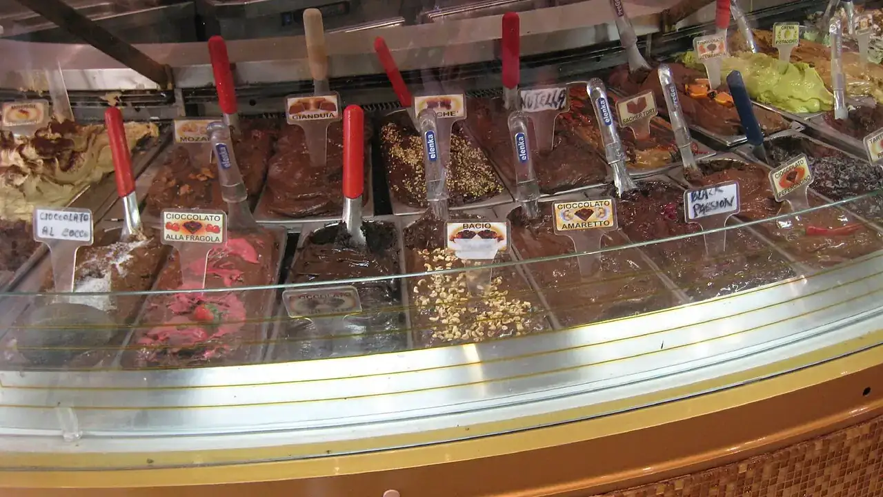 Gelato tubs in a cabinet